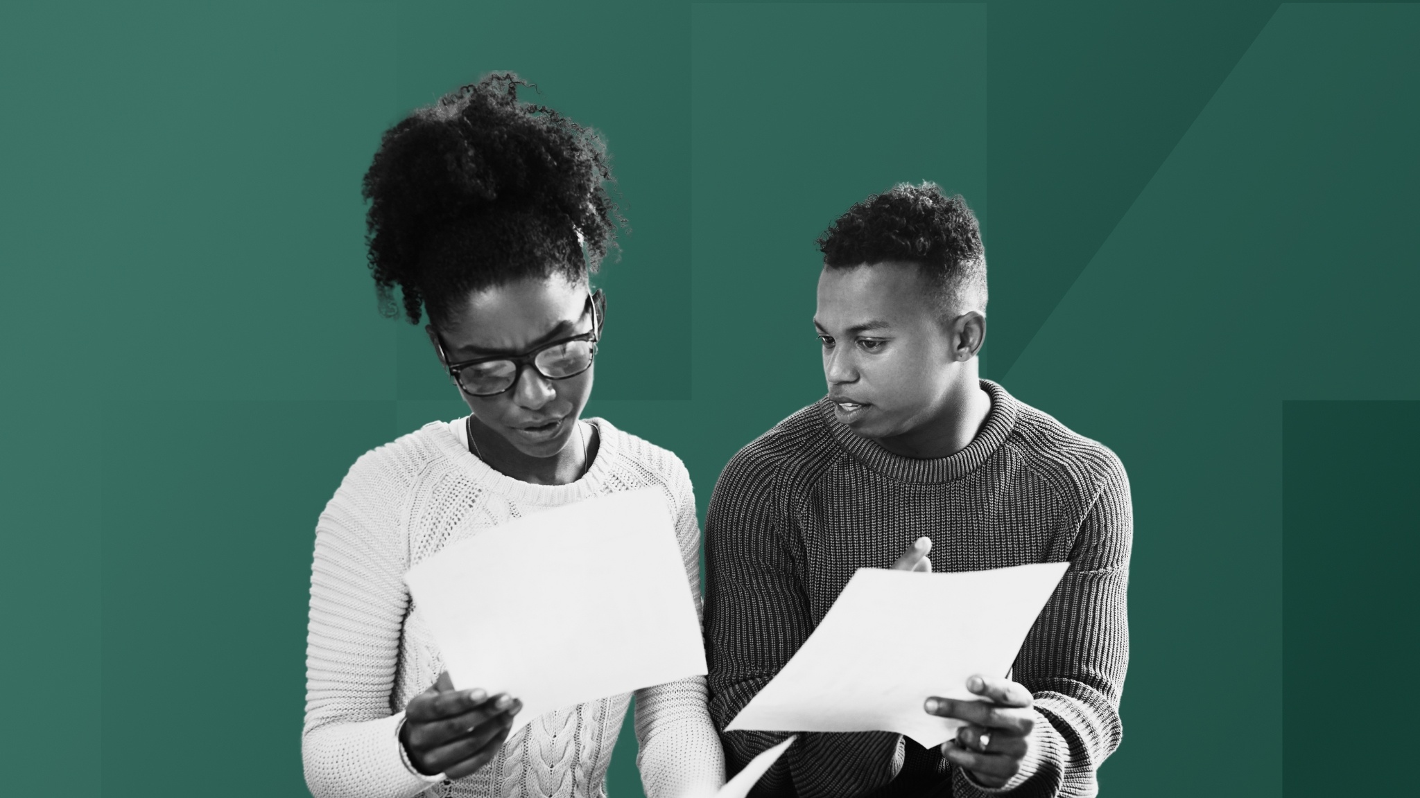 man-and-woman-looking-at-paperwork-together