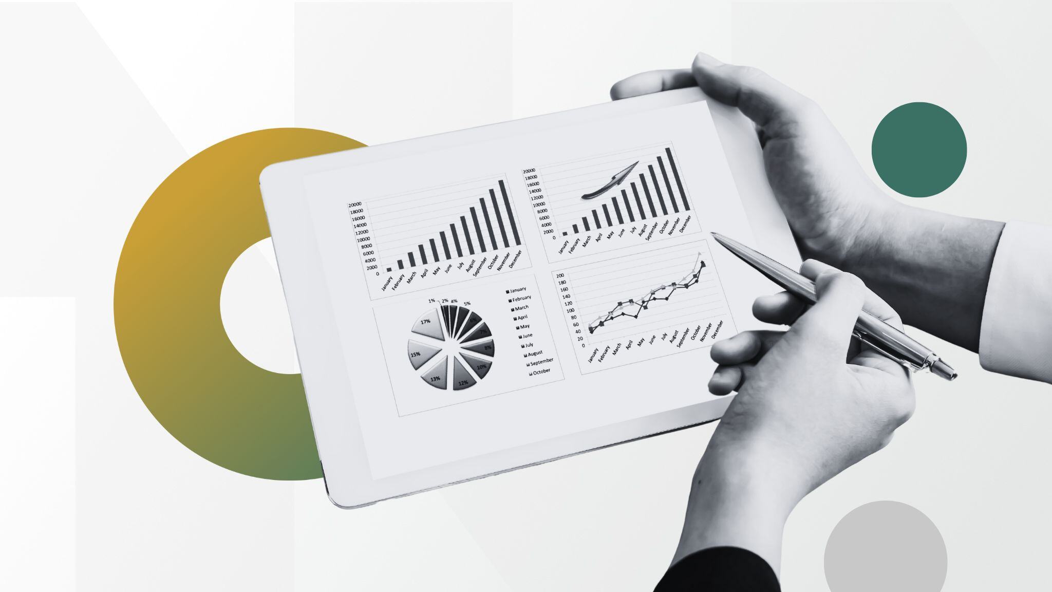 hand-using-tablet-with-charts-and-graphs